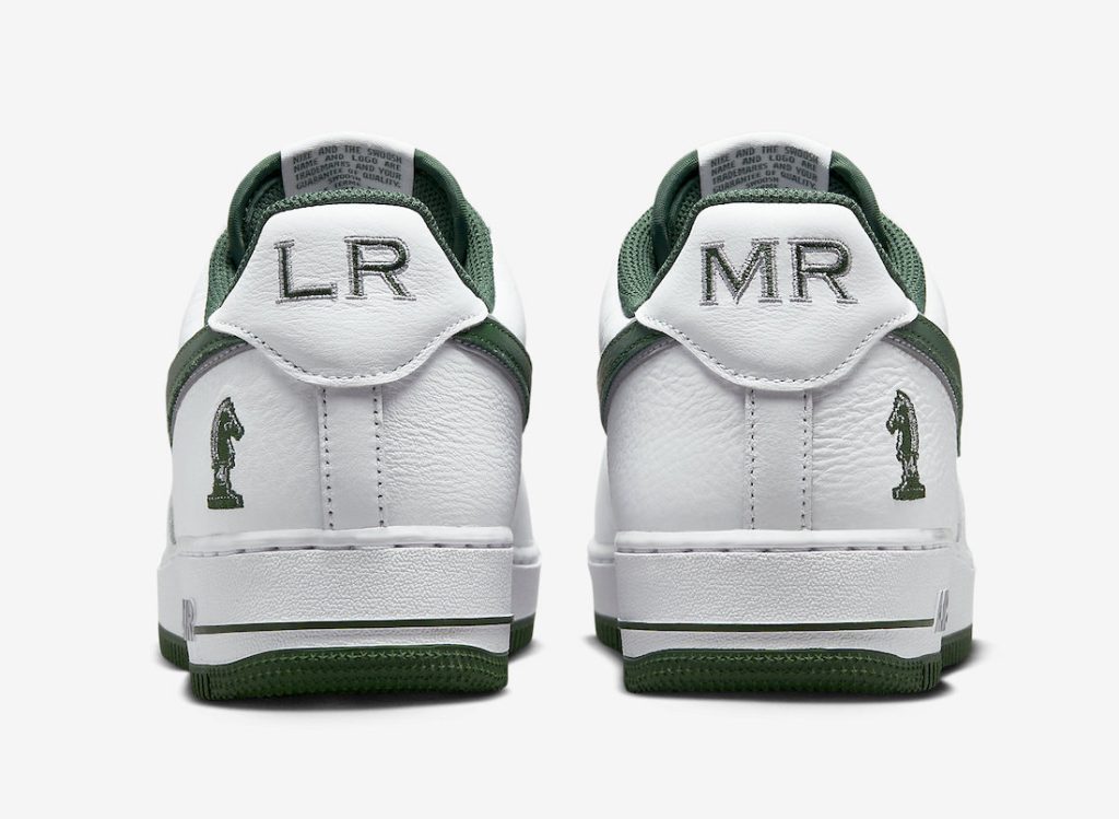Nike Air Force 1 'Four Horsemen' sneakers with a white tumbled leather upper, Deep Forest Green and Wolf Grey accents, and a unique knight chesspiece design on the lateral heel.