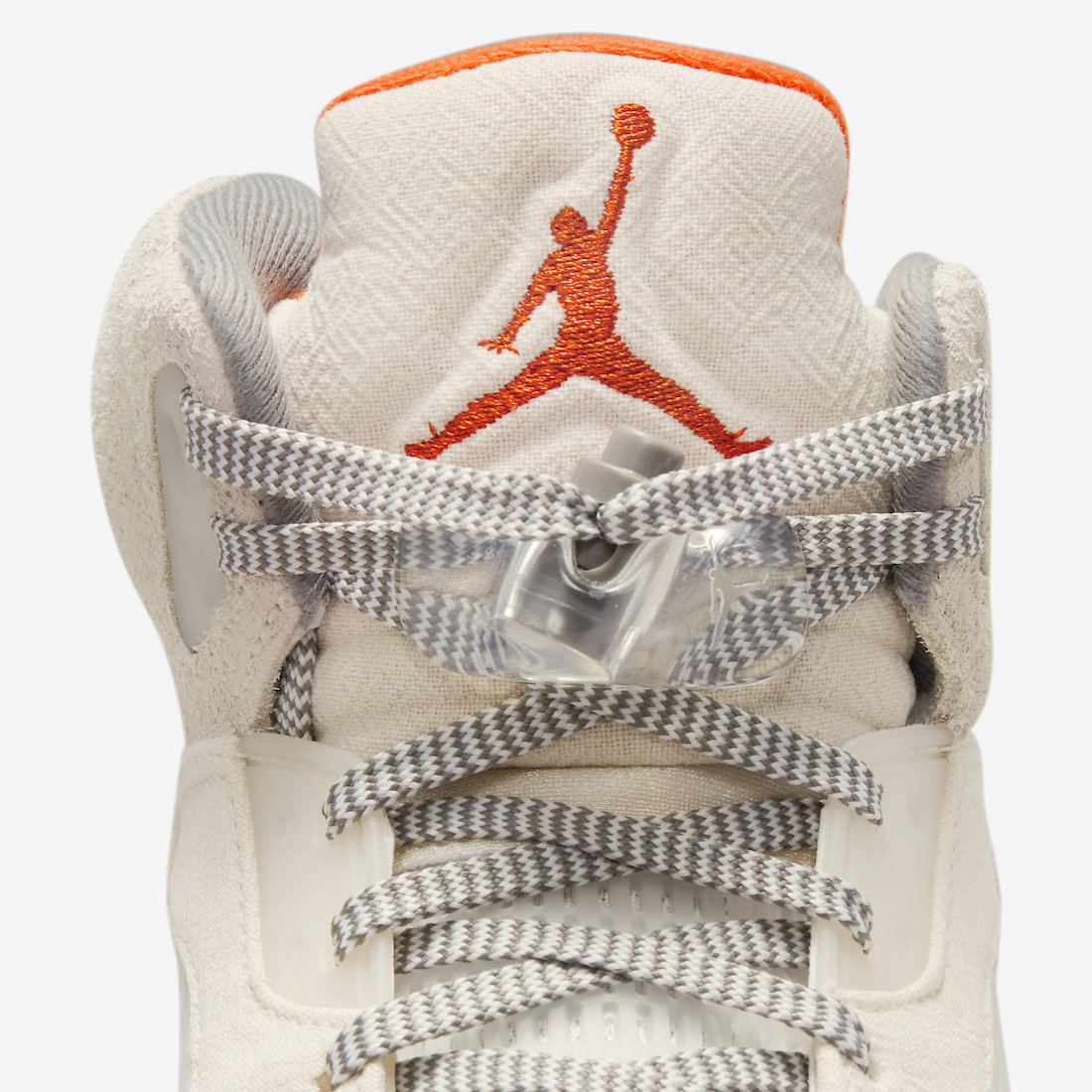 Top-down view of the Air Jordan 5 SE Craft 'Light Orewood Brown' sneakers highlighting the premium suede construction and contrasting orange accents on the tongue.