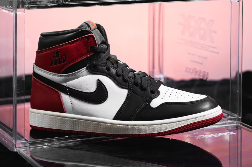 The iconic Air Jordan 1 Nike "Black Toe" gets a fresh twist! This reimagined version features premium leather, a touch of history, and a classic colorway. Releasing October 18th for $180 USD via Nike SNKRS.