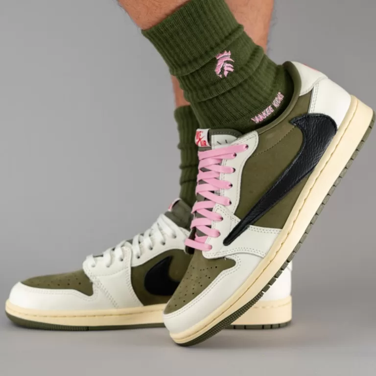 Travis Scott's Air Jordan 1 Low OG gets a revamped release schedule. Originally slated for 2025, the "Medium Olive" colorway takes center stage on September 9th for $150 USD via Nike SNKRS and retailers.